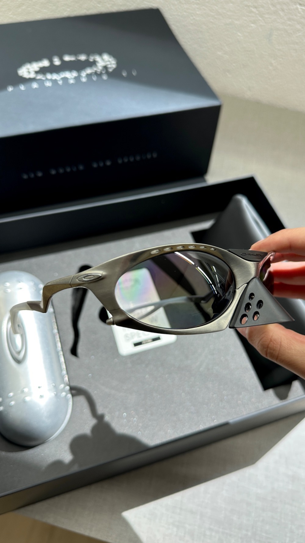 Óculos Oakley Plantaris TI Raw Titanium Prizm Black
