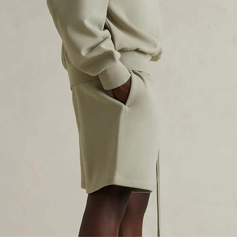 Shorts Fear of God Essentials Soccer Fleece Sweat Abbey Stone - Droper