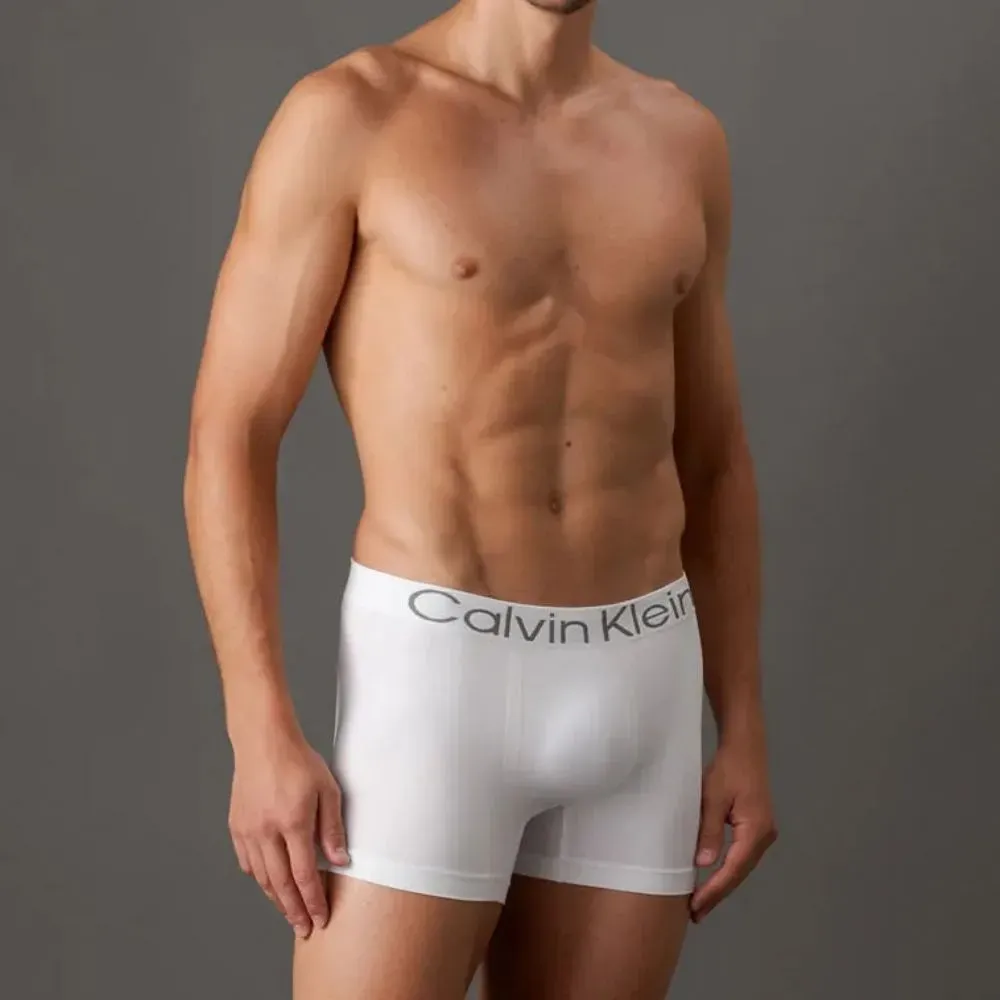 Cueca Calvin Klein Kit 3 Cuecas Trunk Seamless Flamê Black White Grey foto 1