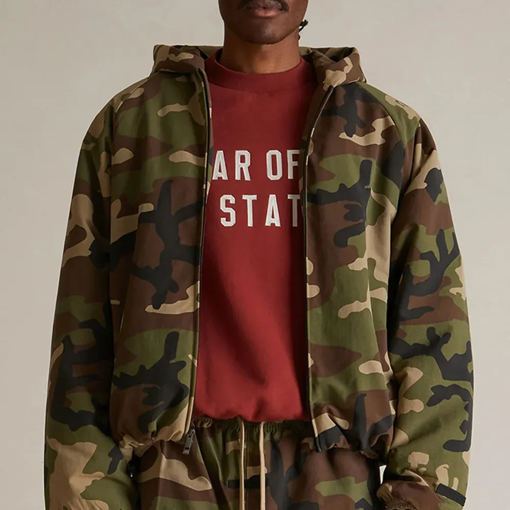 Jaqueta Fear of God Essentials Military Hooded Woodland Camo - Droper