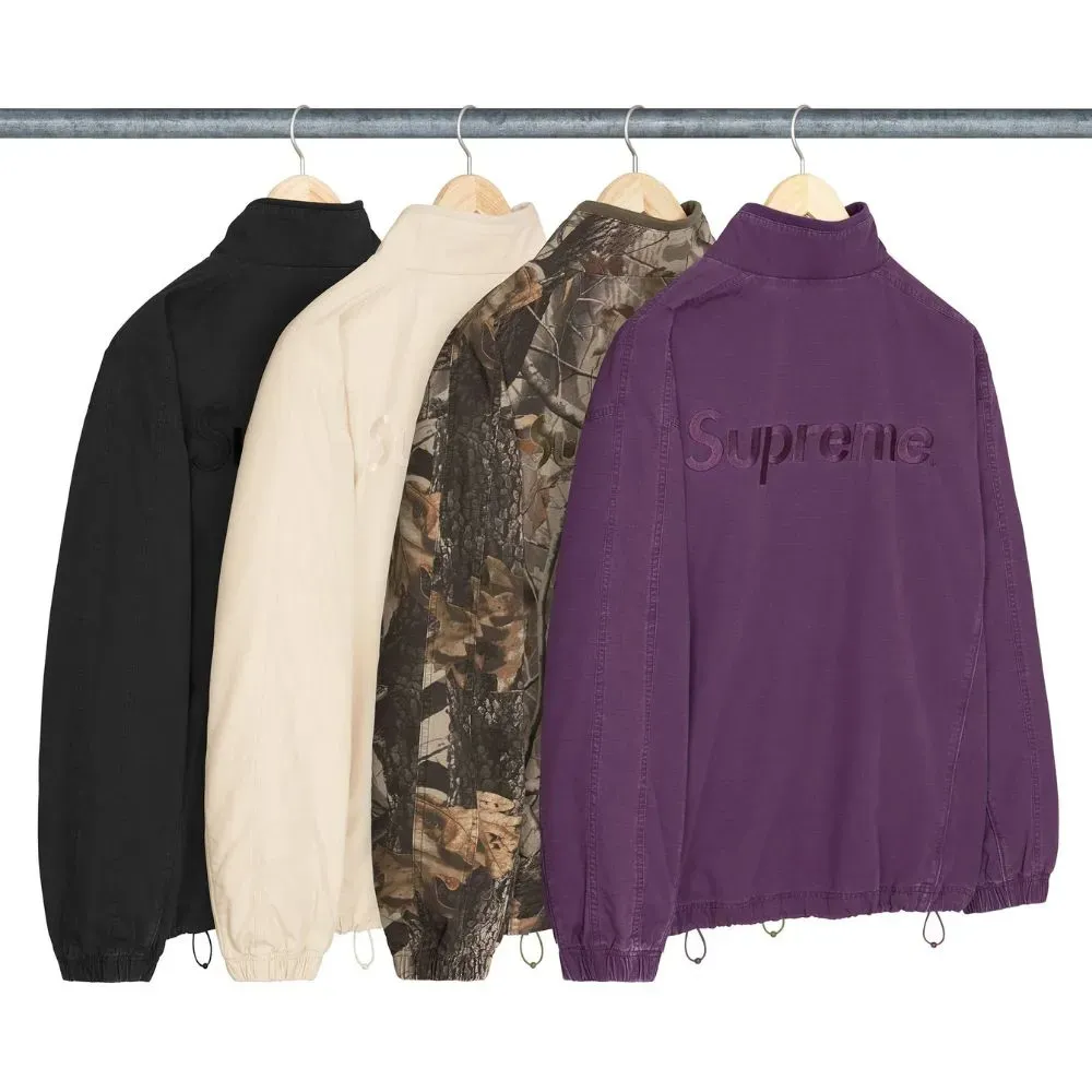 Umbro x Supreme Jaqueta Cotton Ripstop Track Hardwoods Camo SS26