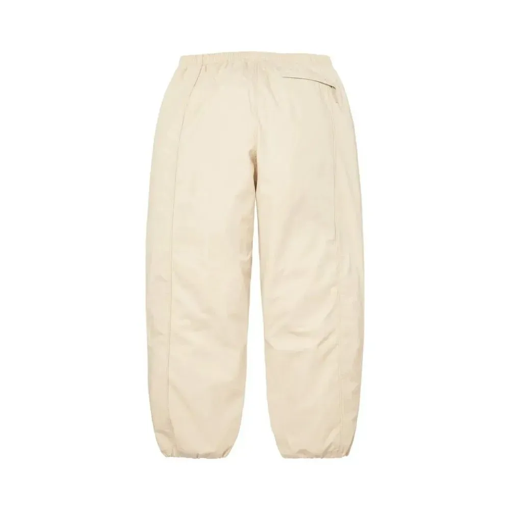 Umbro x Supreme Calça Cotton Ripstop Track Stone SS26-W1 - Droper