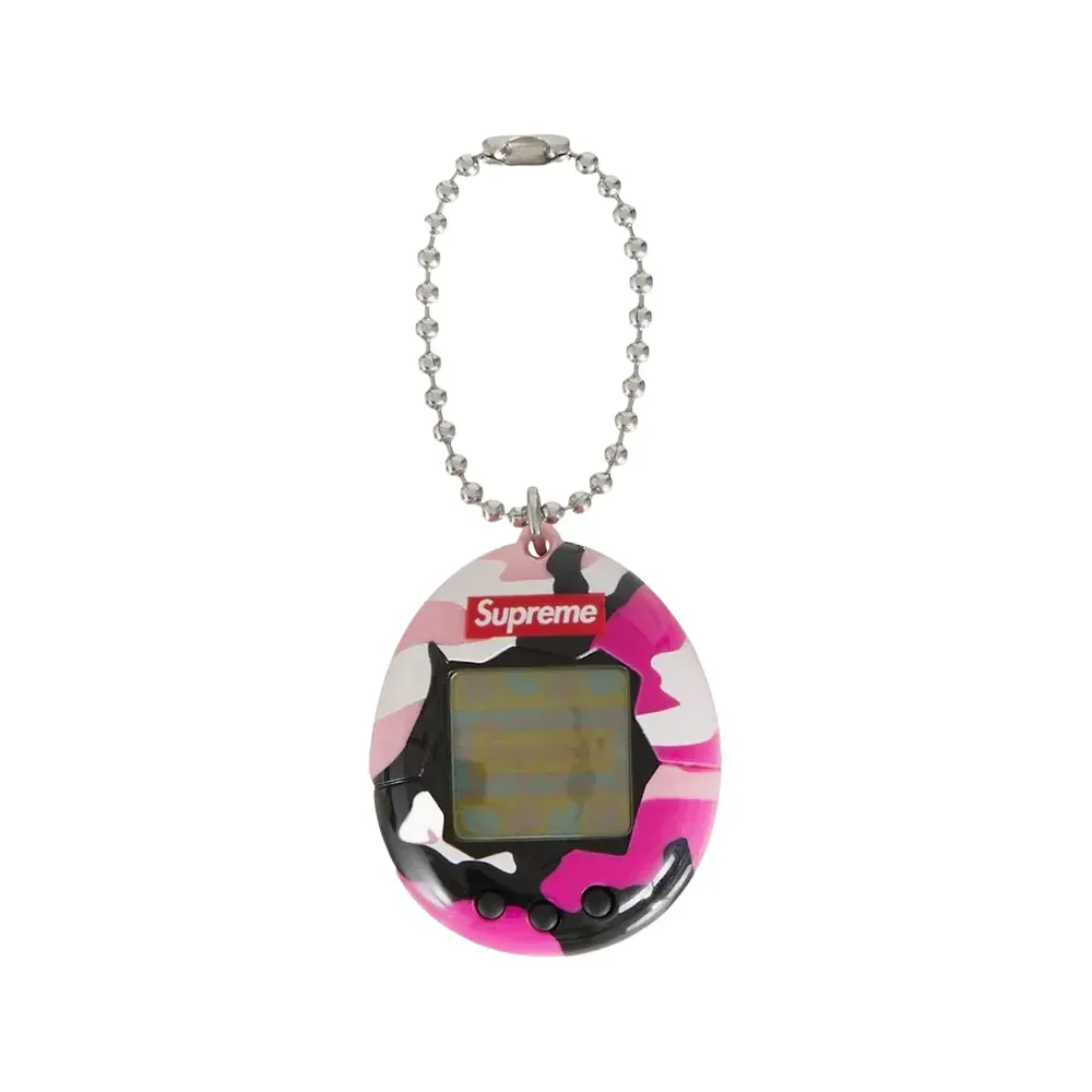 Supreme Tamagotchi カモフラージュ Bandai x Supreme Tamagotchi Camo Pink Yellow Black SS23 - Droper