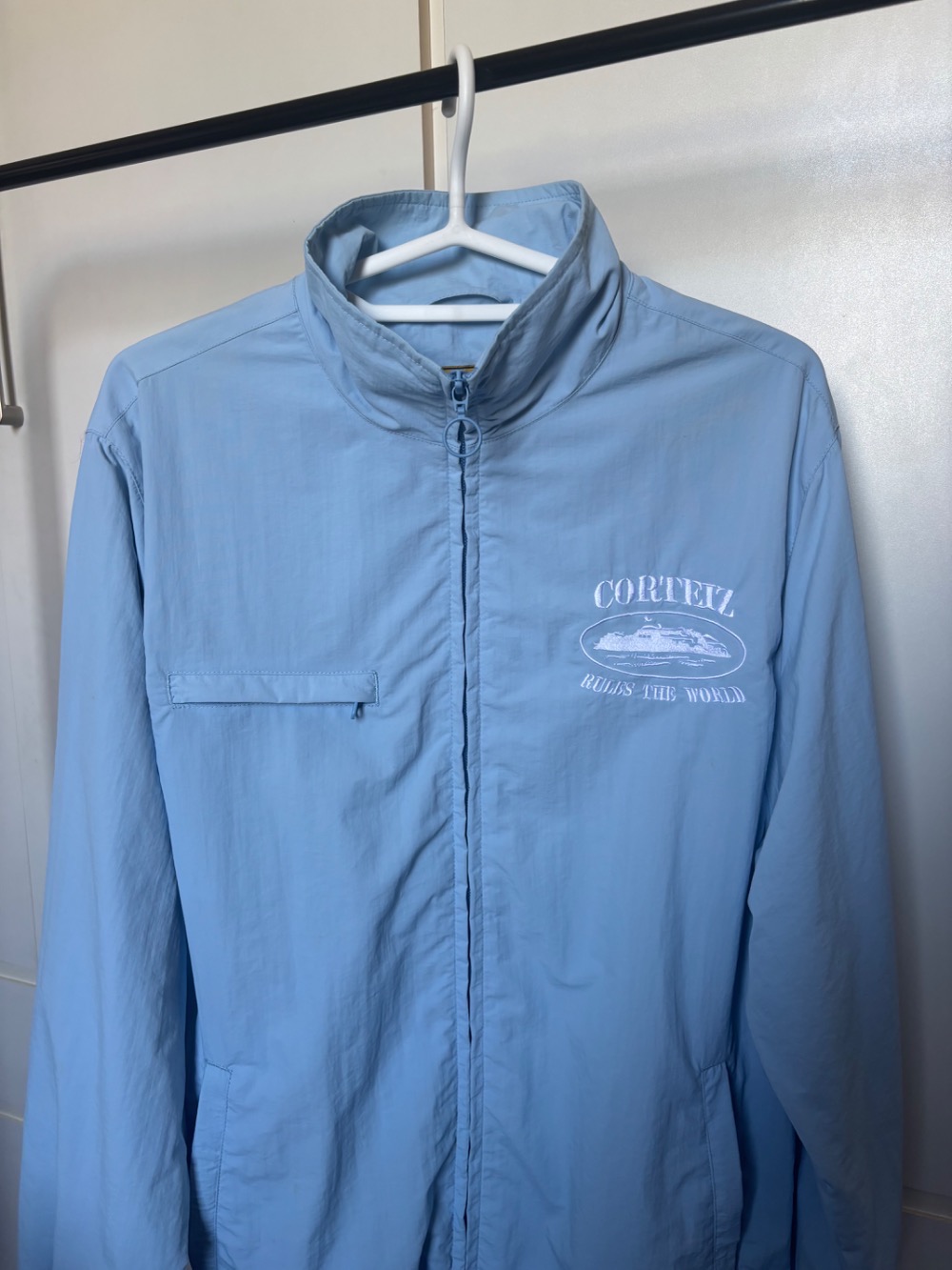 Jaqueta Corteiz Shukushuku Baby Blu